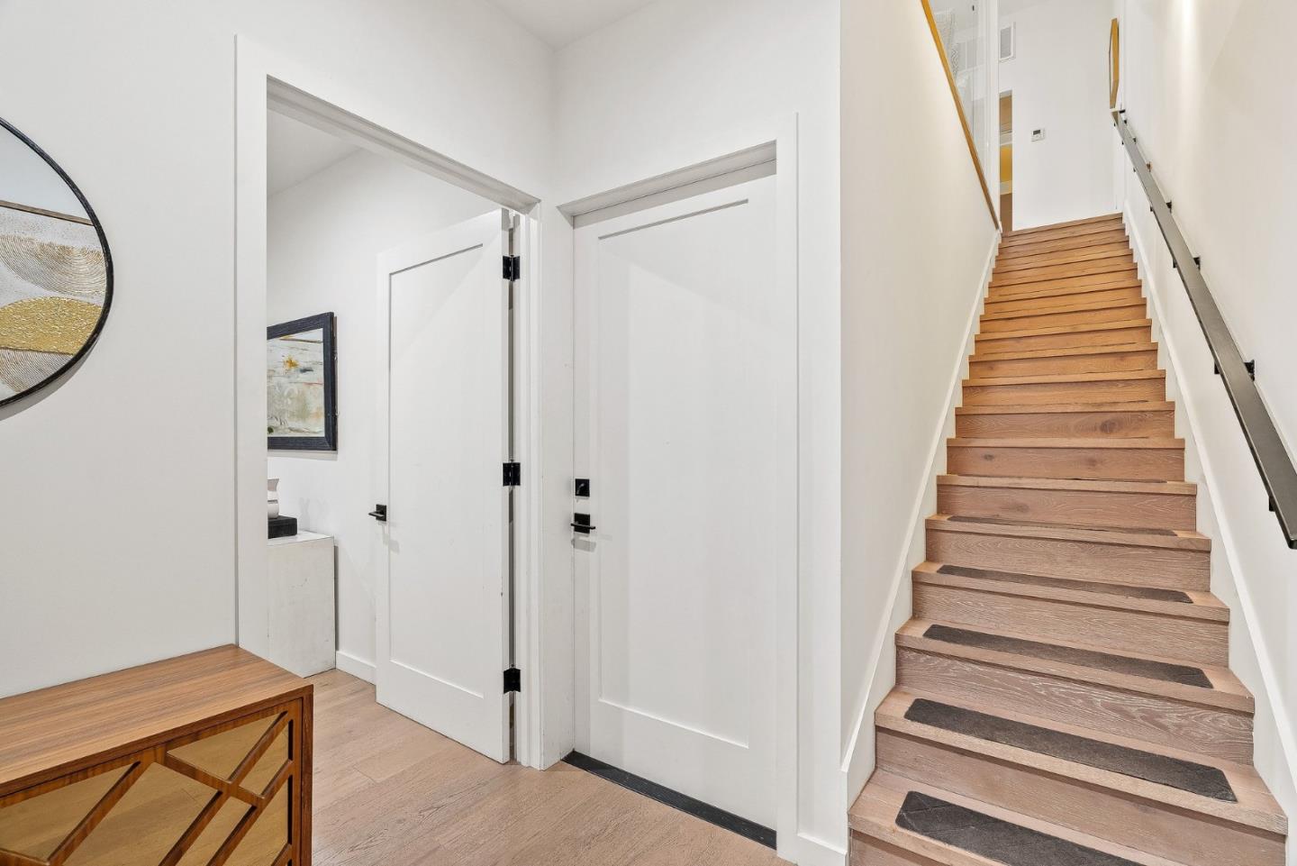 922 Woodside Road Redwood City, CA 94061 - Photo 5 of 30 a view of a hallway with wooden floor and entryway