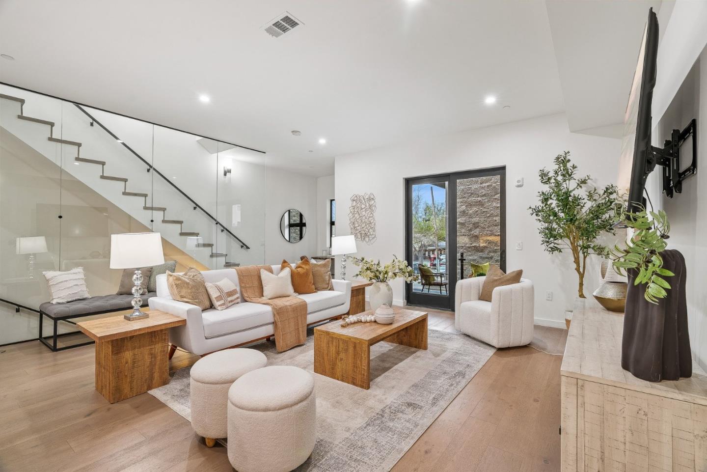 922 Woodside Road Redwood City, CA 94061 - Photo 8 of 30 a living room with furniture and a potted plant