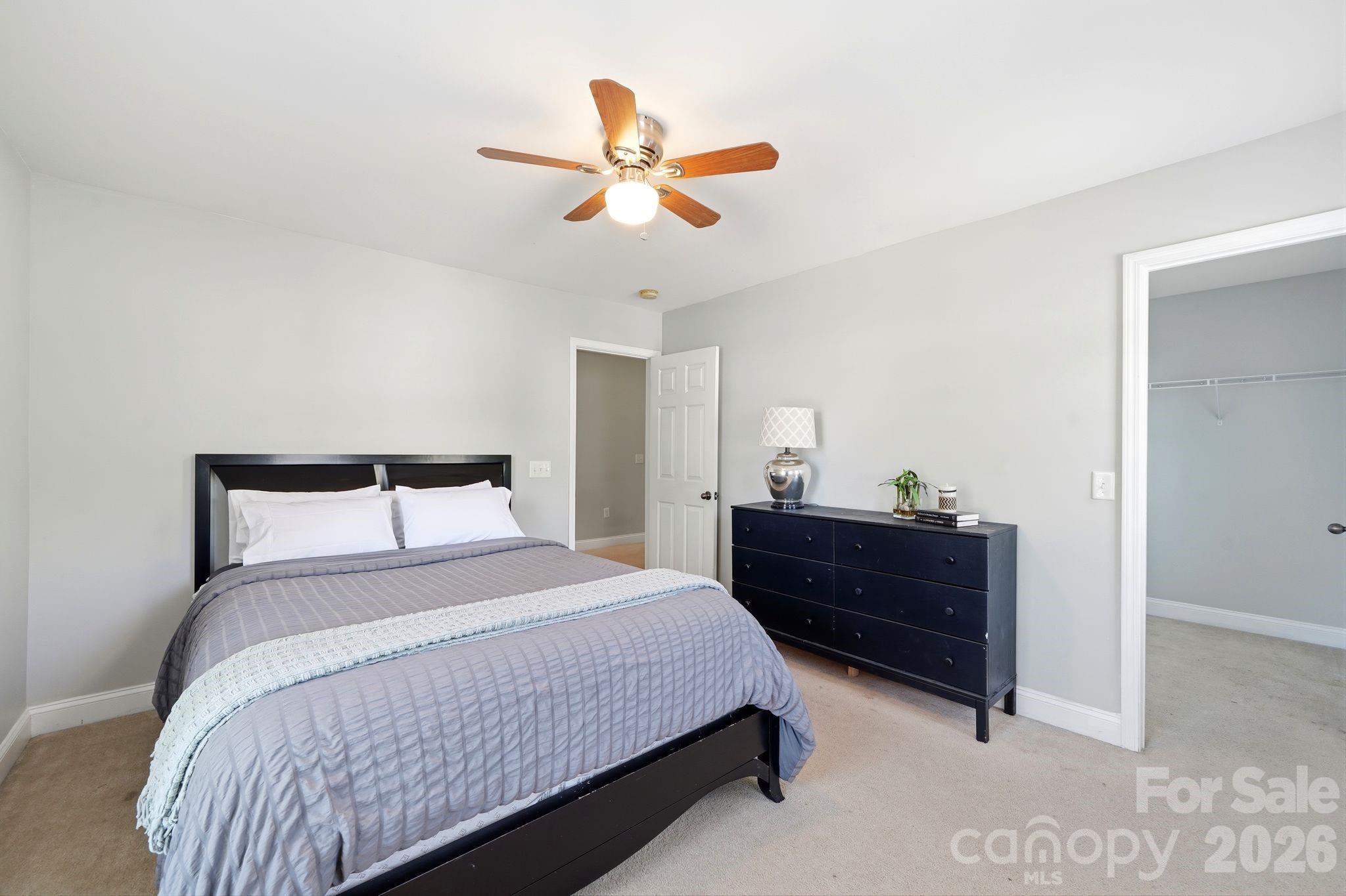 7815 Kuck Road Mint Hill, NC 28227 - Photo 20 of 29 a bedroom with a bed and window