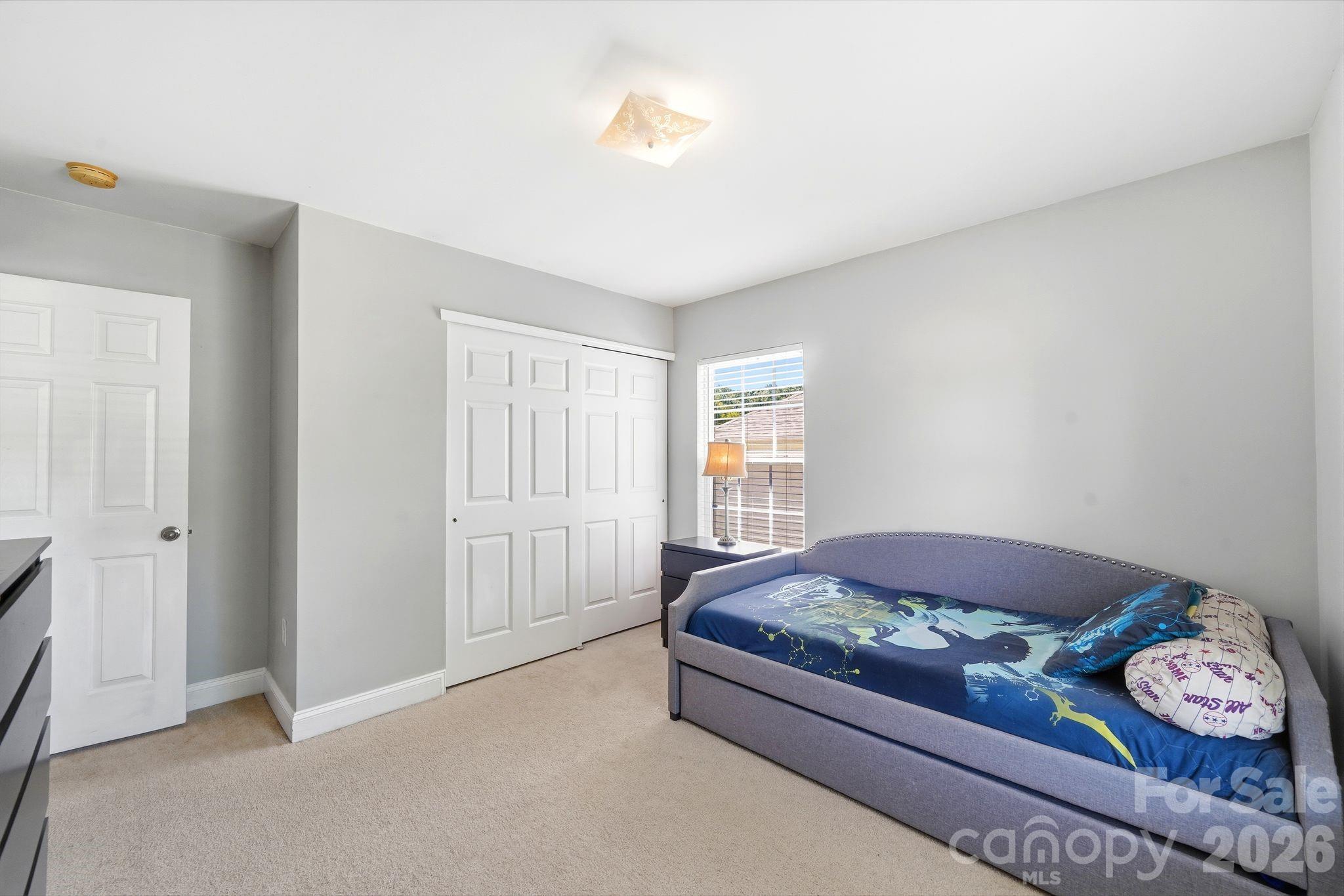 7815 Kuck Road Mint Hill, NC 28227 - Photo 23 of 29 a living room with furniture and a window