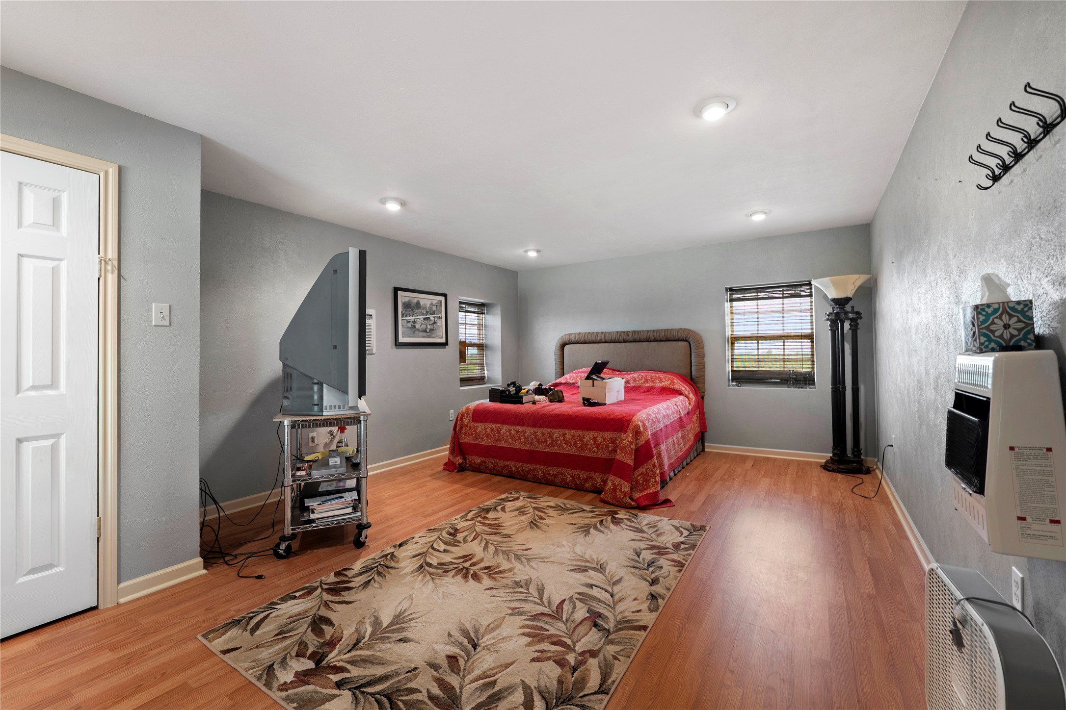 1005 East Buttercup Road Taylor, TX 76574 - Photo 29 of 38 a bed room with a bed and a chair