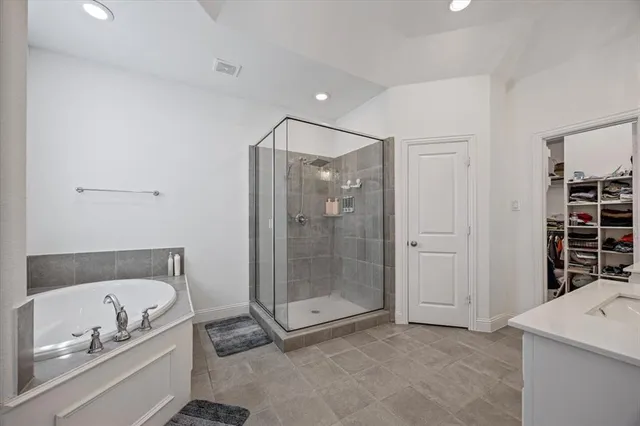 a bed room with a bed and window