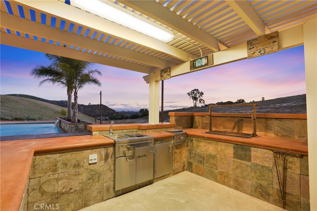 220 Cook Court Templeton, CA 93465 - Photo 33 of 45 a view of a balcony with table and chairs