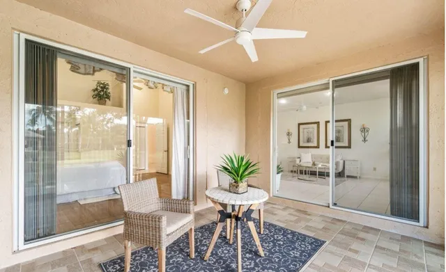 a view of a livingroom with furniture and front door