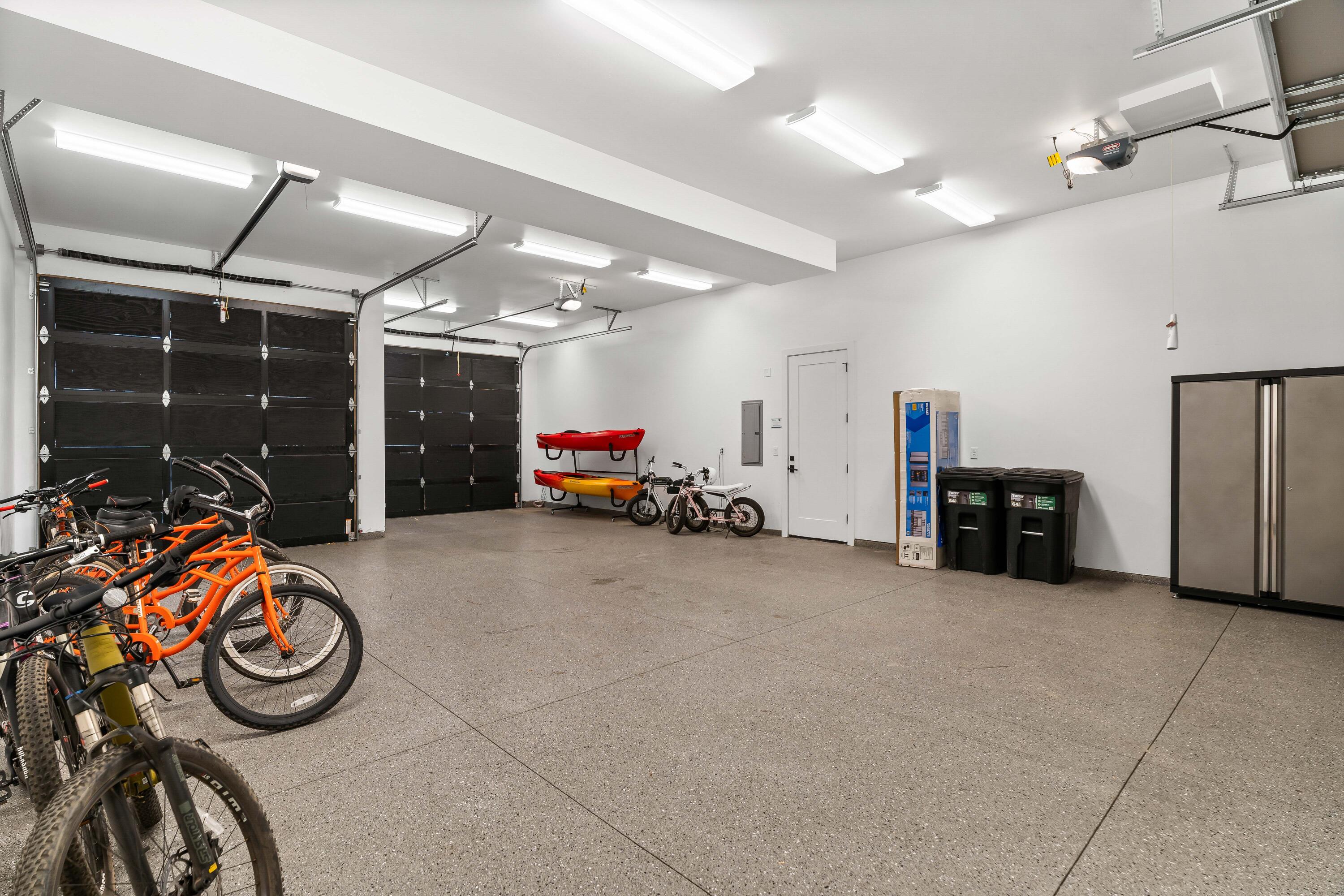 56878 River Road, Unit 2 Sunriver, OR 97707 - Photo 58 of 67 Triple-car garage w/ access door into the hangar.