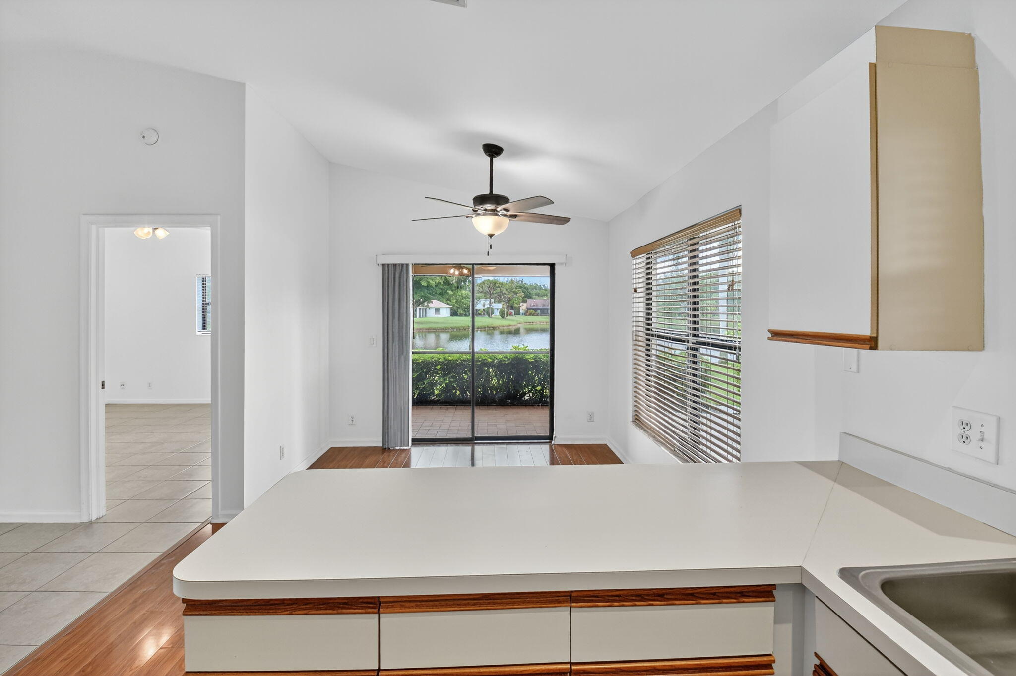 73 Vía De Casas Norte Boynton Beach, FL 33426 - Photo 20 of 60 a view of a kitchen with a sink and a window