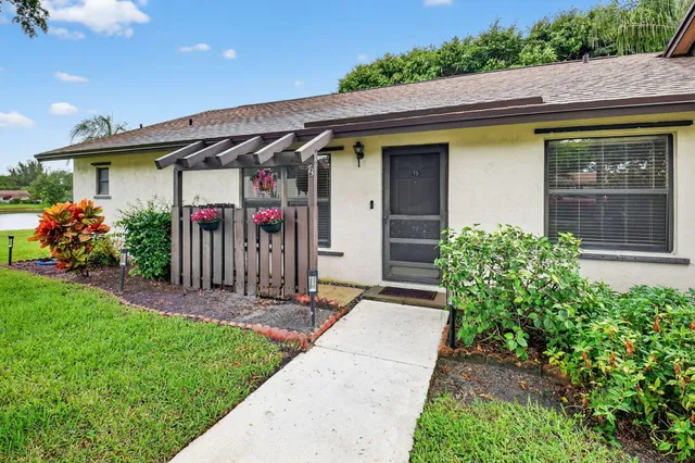 a front view of a house with a porch