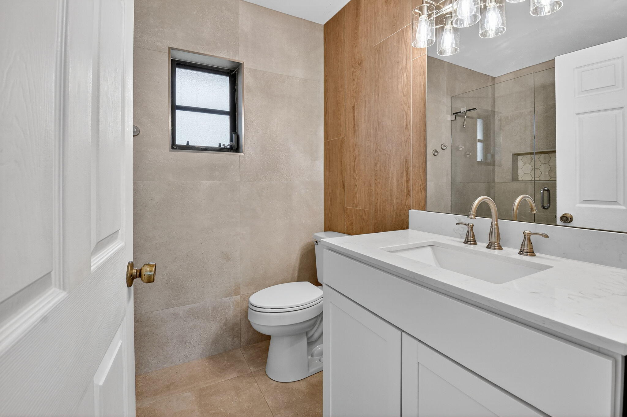 73 Vía De Casas Norte Boynton Beach, FL 33426 - Photo 25 of 60 a bathroom with a sink toilet and mirror