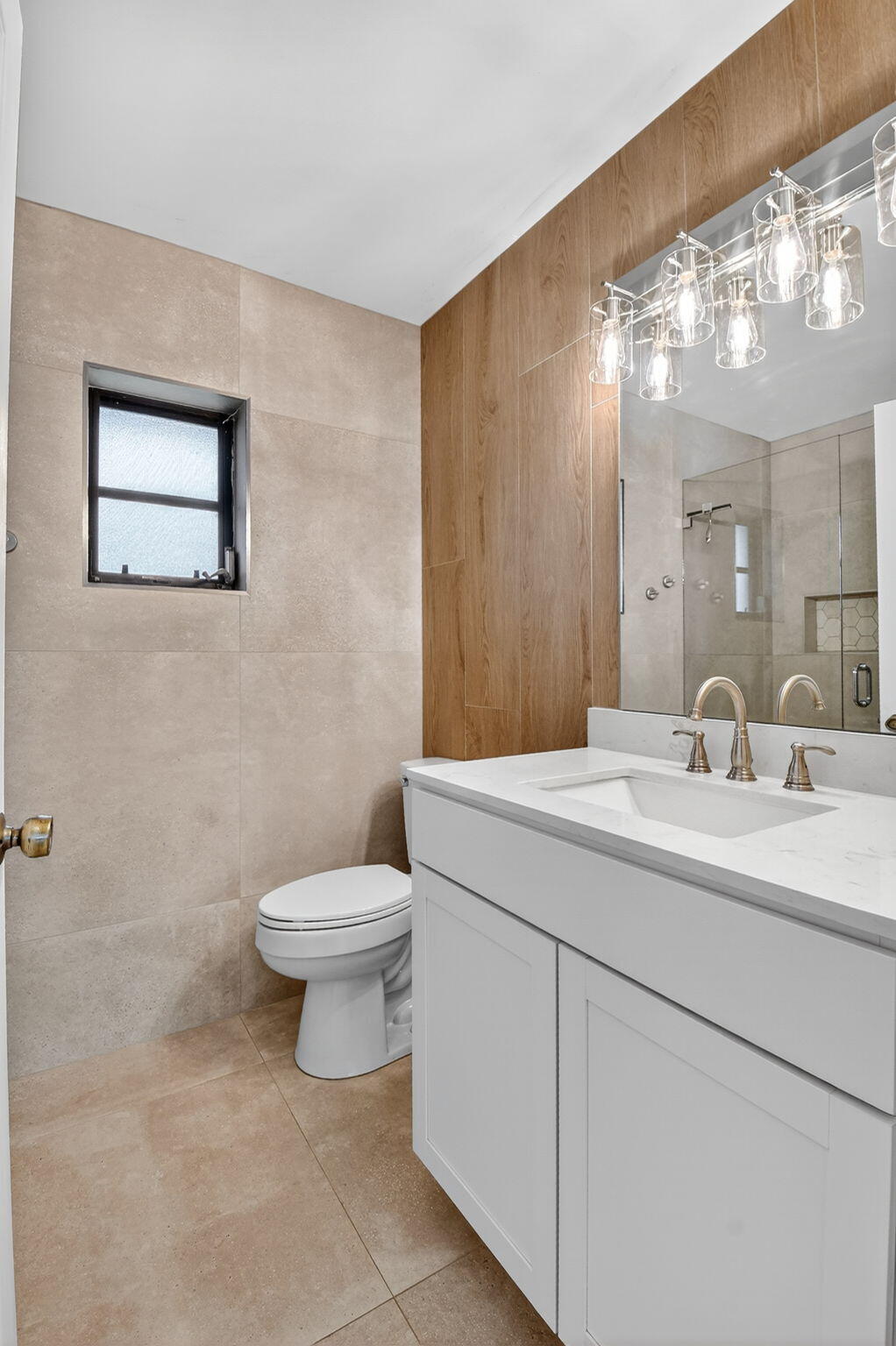 73 Vía De Casas Norte Boynton Beach, FL 33426 - Photo 26 of 60 a bathroom with a toilet a sink and mirror