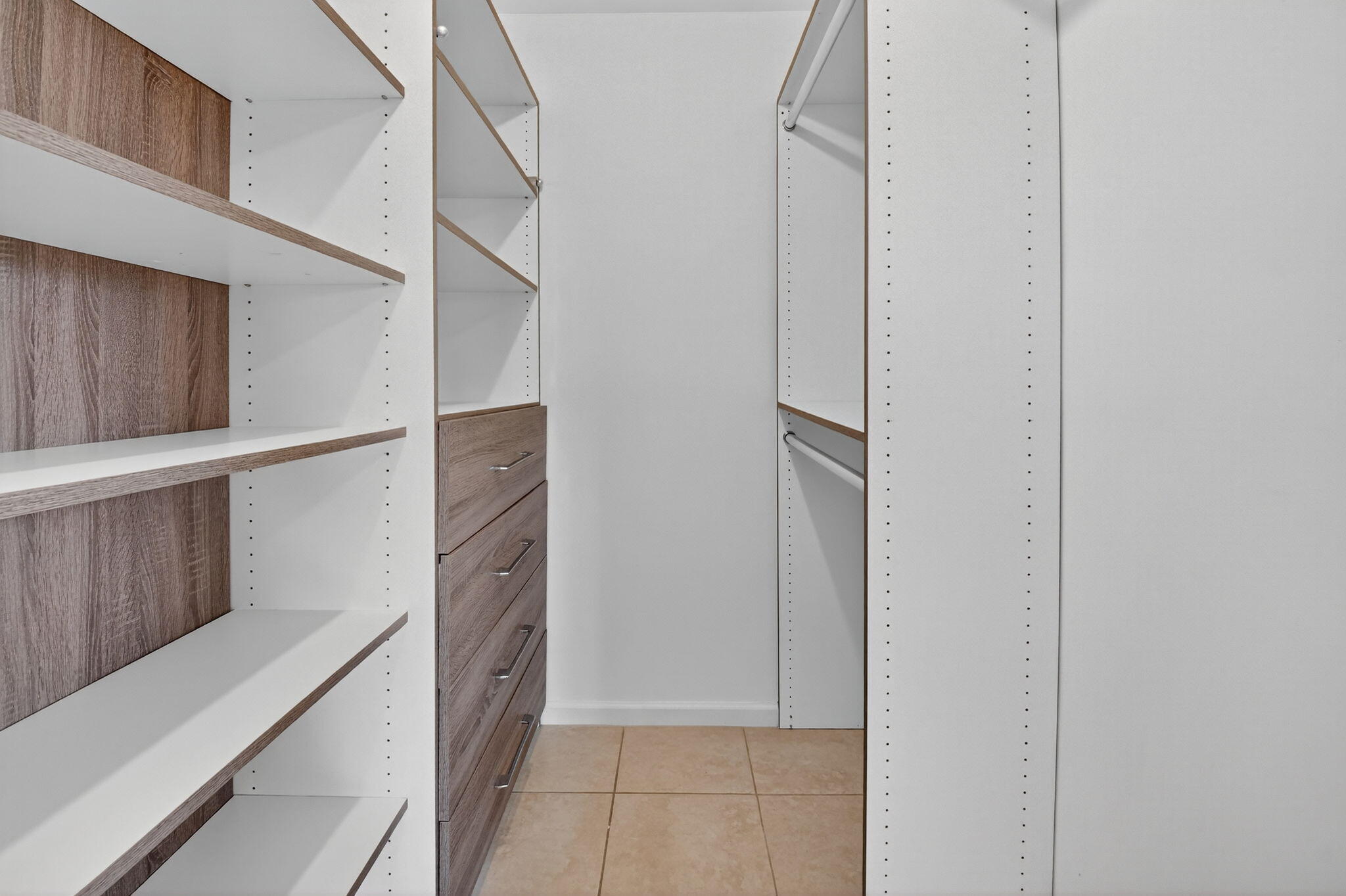 73 Vía De Casas Norte Boynton Beach, FL 33426 - Photo 28 of 60 a view of walk in closet