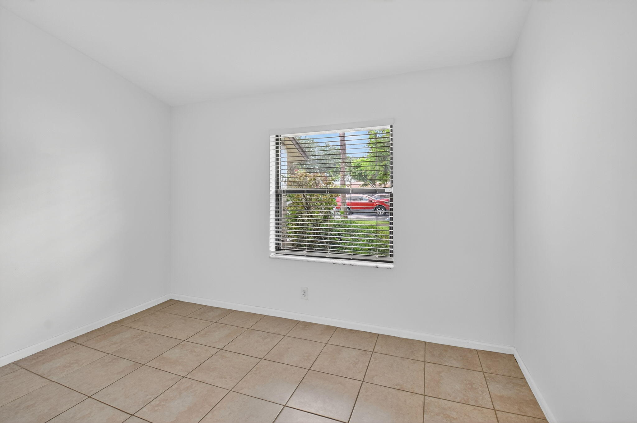 73 Vía De Casas Norte Boynton Beach, FL 33426 - Photo 29 of 60 a view of an empty room with a window