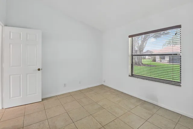 a view of swimming pool with a yard