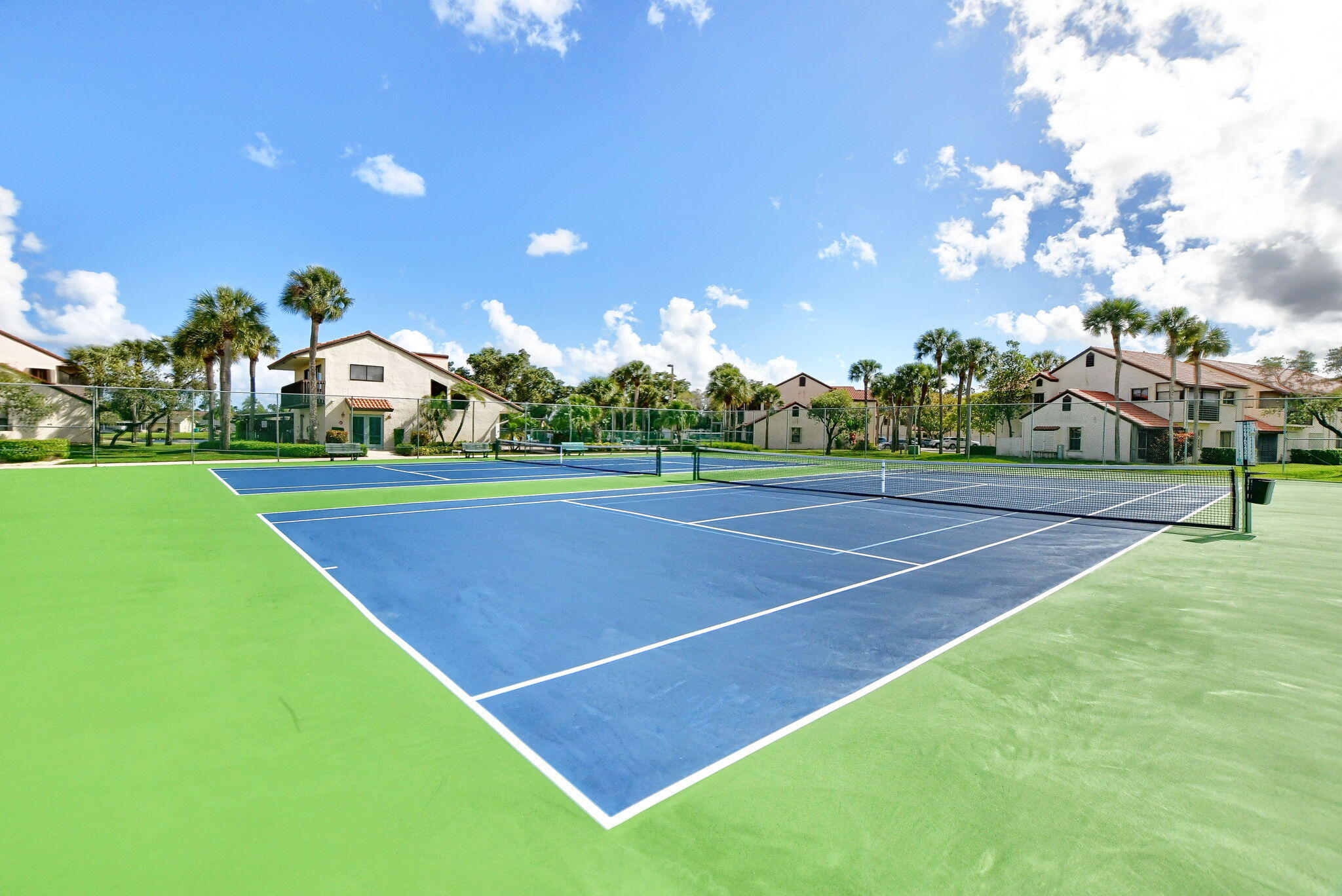 73 Vía De Casas Norte Boynton Beach, FL 33426 - Photo 41 of 60 a view of a tennis court