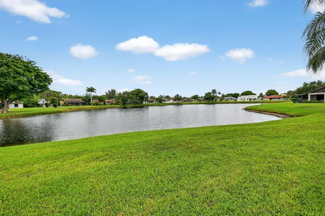 a view of a lake with a big yard