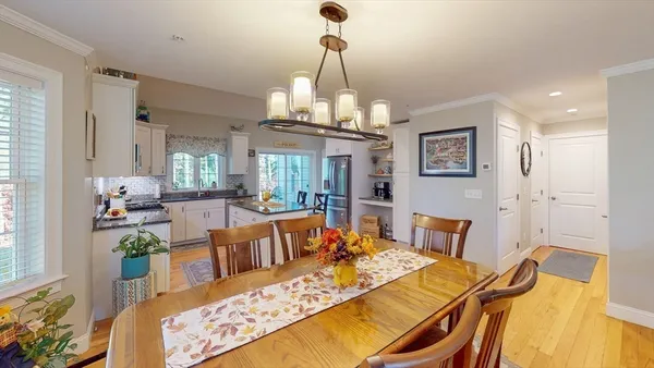 a bed room with furniture and a chandelier