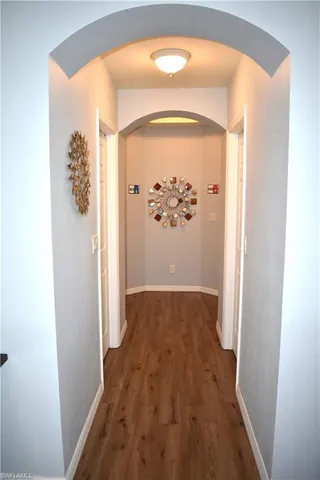 a spacious bathroom with a bathtub and window