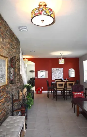 a view of a living room and dining room
