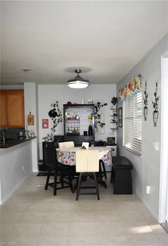 a room with furniture and a flat screen tv