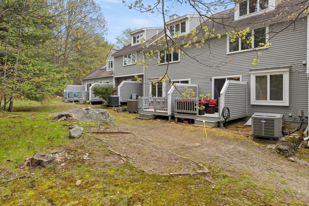 4203 Woodbridge Road, Unit 4203 Peabody, MA 01960 - Photo 29 of 31 a house view with a backyard space