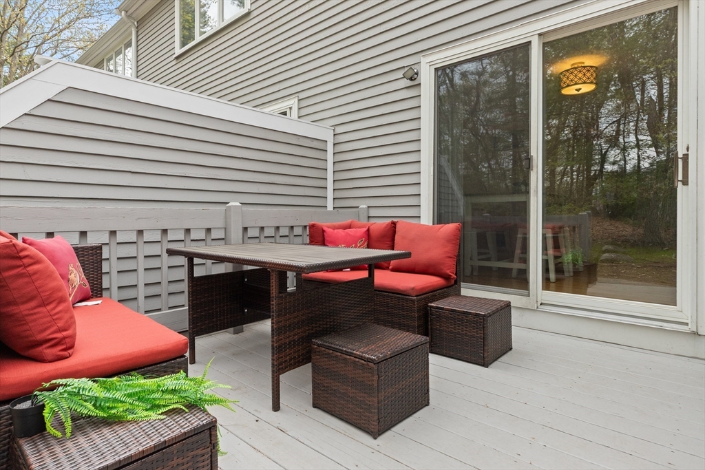 4203 Woodbridge Road, Unit 4203 Peabody, MA 01960 - Photo 10 of 31 a outdoor living space with furniture and garden view
