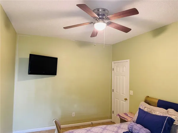 a view of a livingroom with a flat screen tv