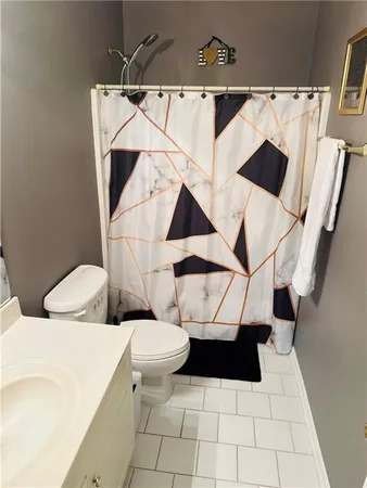 a bathroom with a sink and a toilet