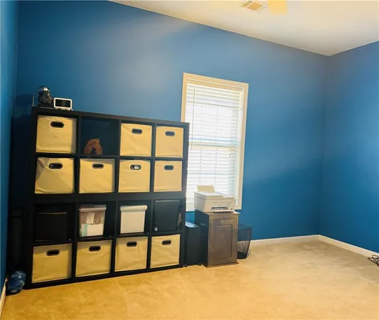 a view of a bedroom with cabinet