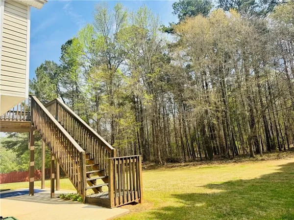 a view of swimming pool with seating space