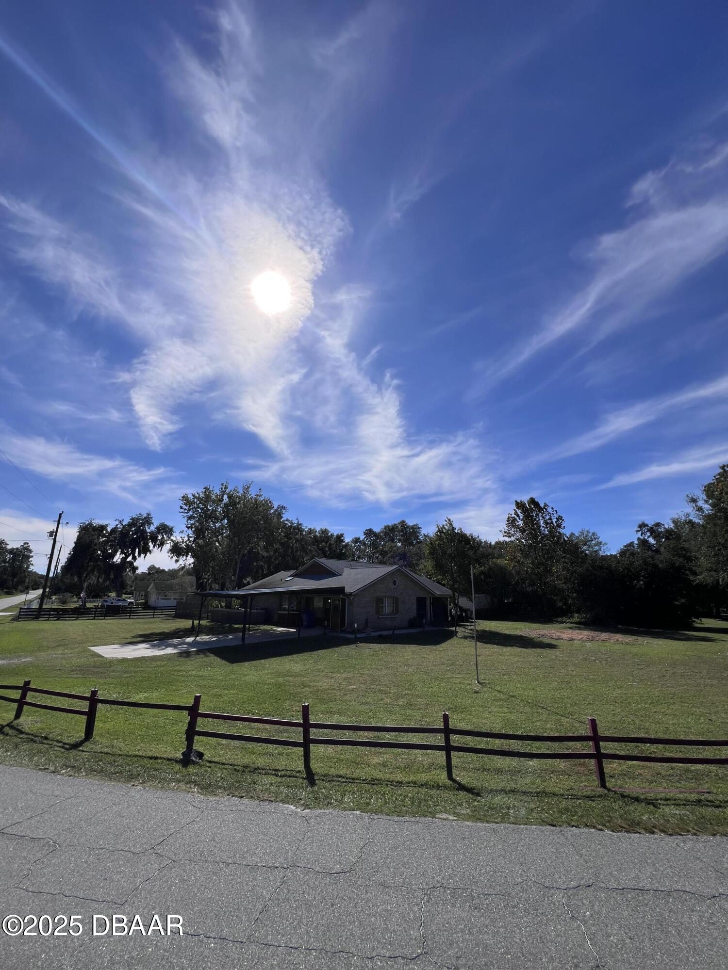 2550 Lake Ruby Road DeLand, FL 32724 - Photo 5 of 20 a view of park with bench and green space