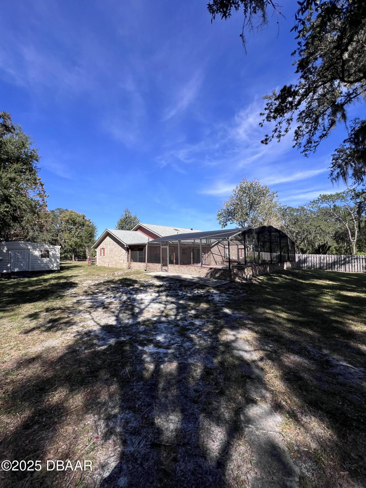 2550 Lake Ruby Road DeLand, FL 32724 - Photo 6 of 20 a view of a house with a yard
