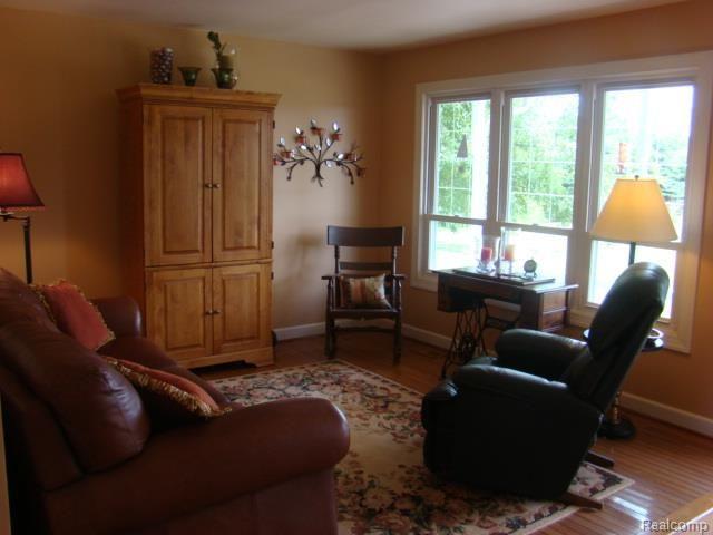 4214 Stanley Road Columbiaville, MI 48421 - Photo 8 of 46 Living_room_large_window.jpg