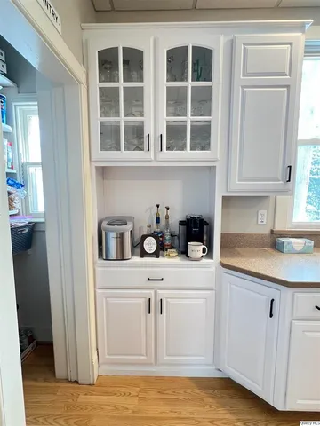 a kitchen with stainless steel appliances granite countertop a sink and cabinets