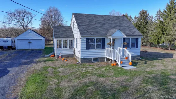 front view of a house with a yard