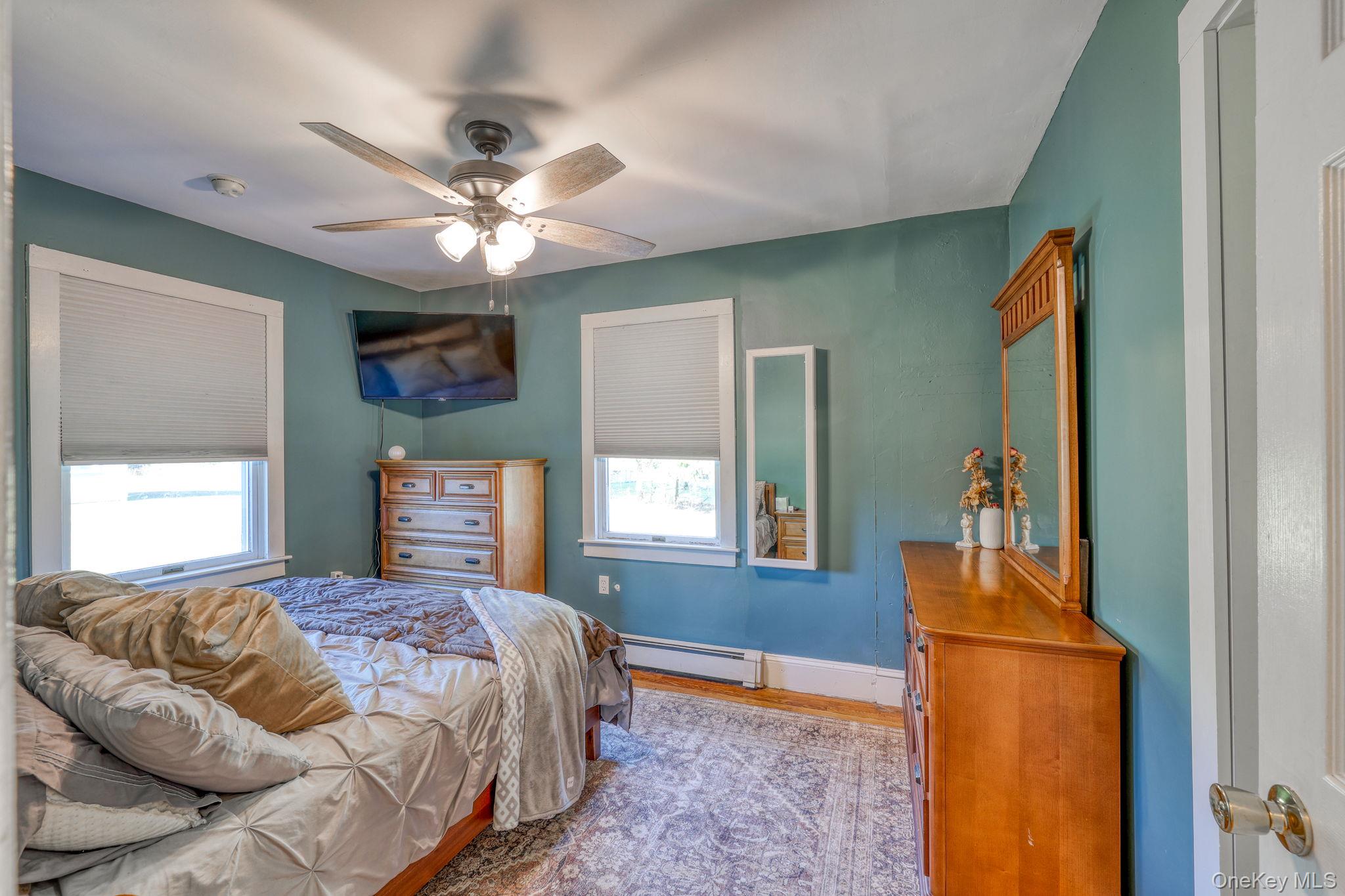 143 Plains Road Walden, NY 12586 - Photo 15 of 36 Primary bedroom with a walk-in closet.