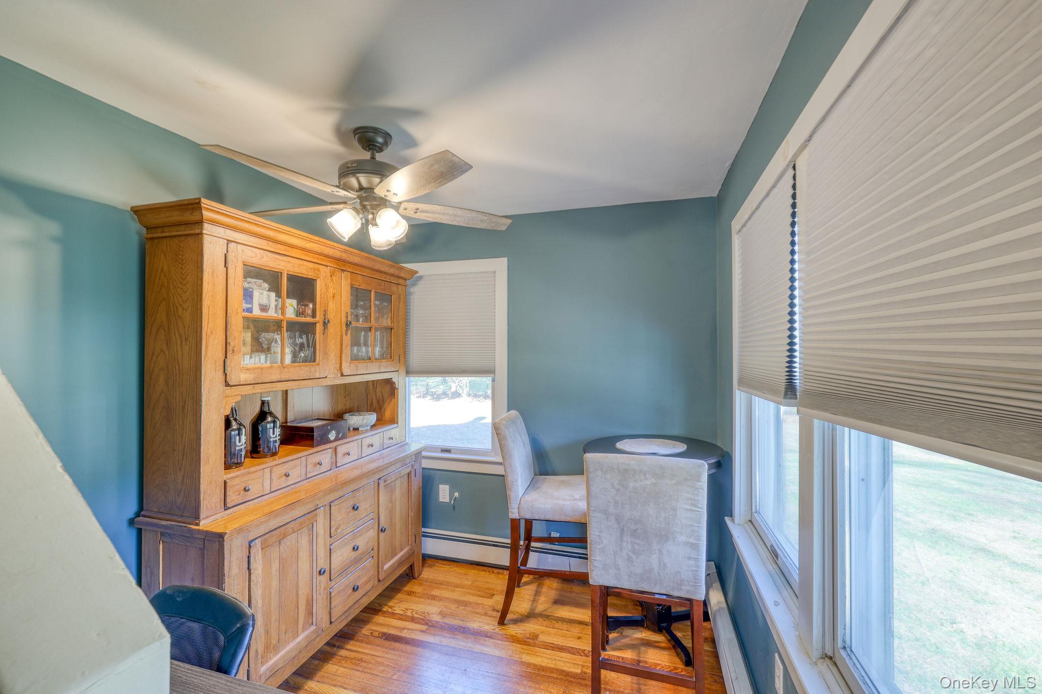 143 Plains Road Walden, NY 12586 - Photo 17 of 36 Home office with light wood finished floors and a baseboard radiator
