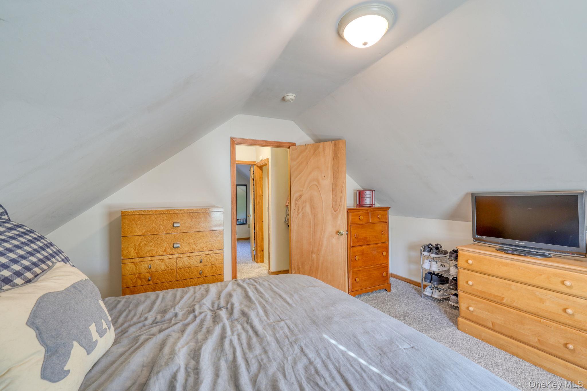 143 Plains Road Walden, NY 12586 - Photo 25 of 36 Bedroom featuring carpet flooring and lofted ceiling