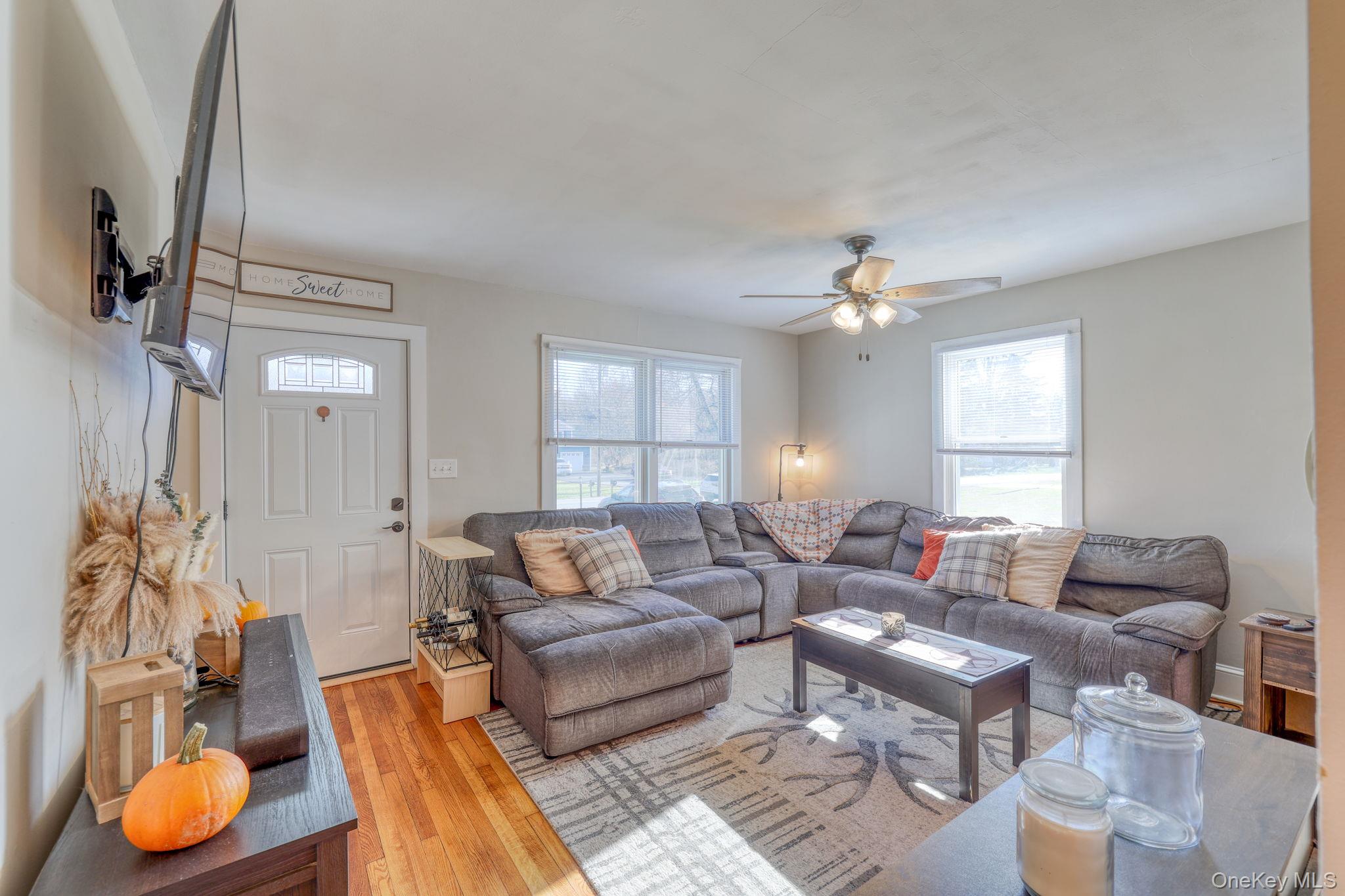 143 Plains Road Walden, NY 12586 - Photo 10 of 36 Living room featuring wood-type flooring and ceiling fan