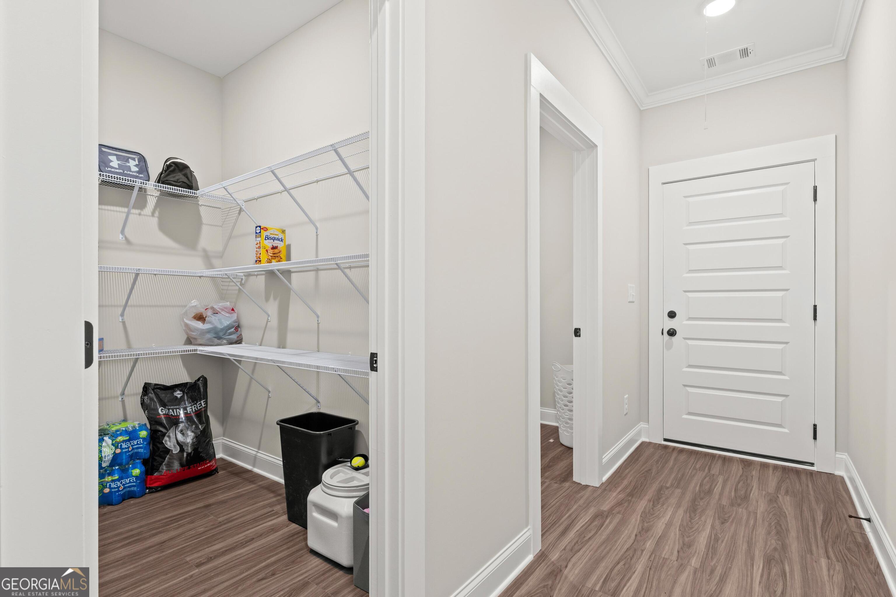 340 Happy Hollow Road Roopville, GA 30170 - Photo 14 of 22 a view of room with wooden floor and closet