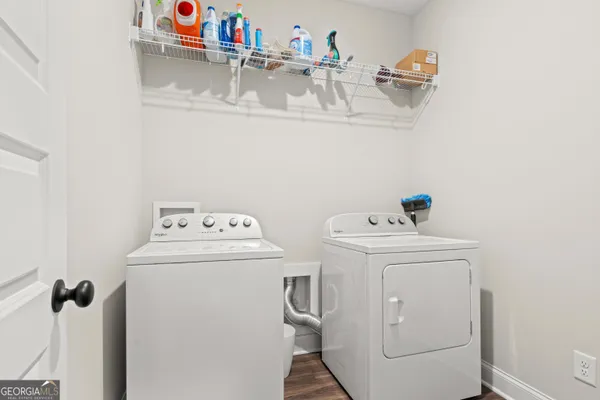a utility room with dryer and washer