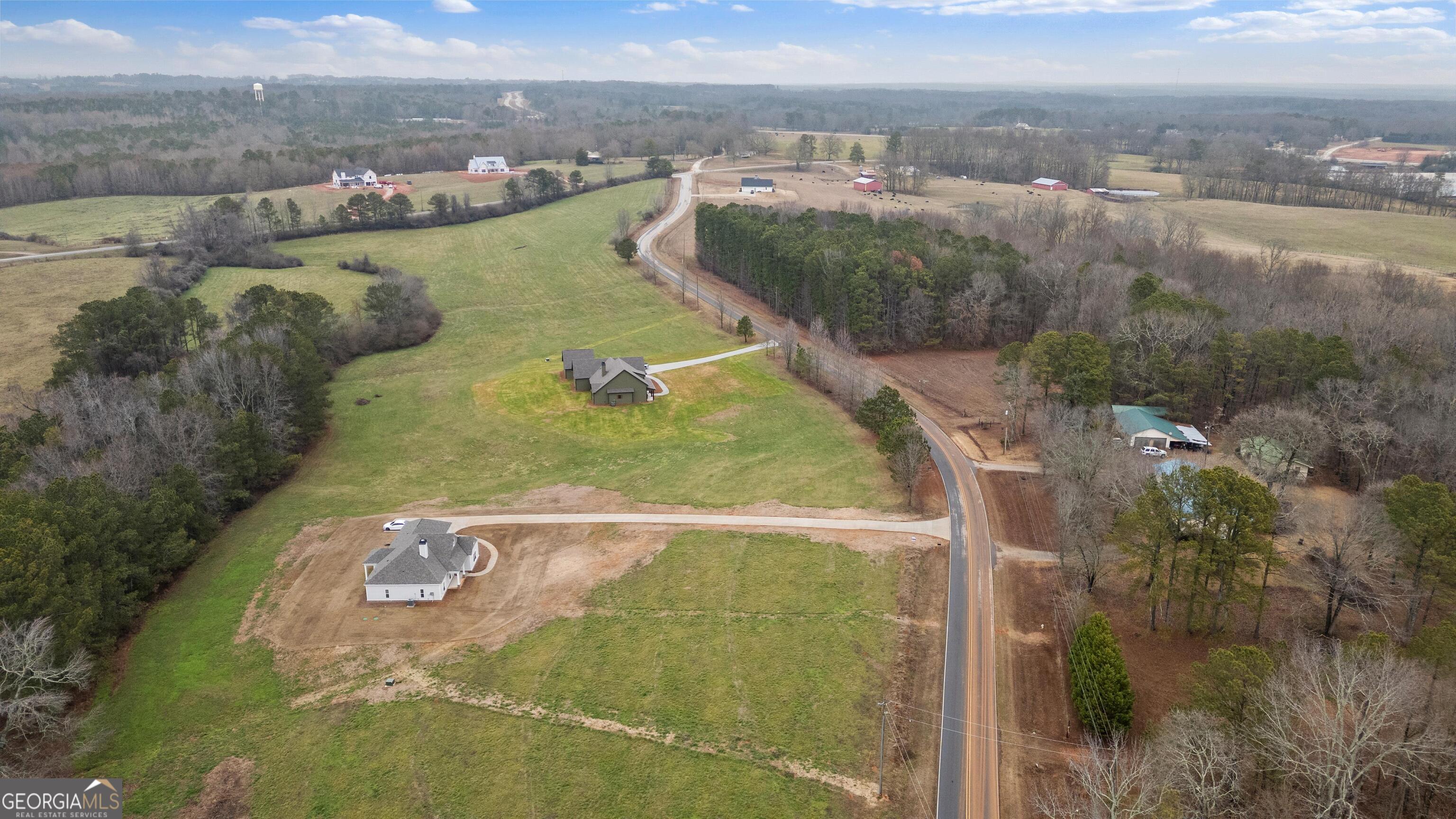 340 Happy Hollow Road Roopville, GA 30170 - Photo 21 of 22 an aerial view of residential houses with outdoor space