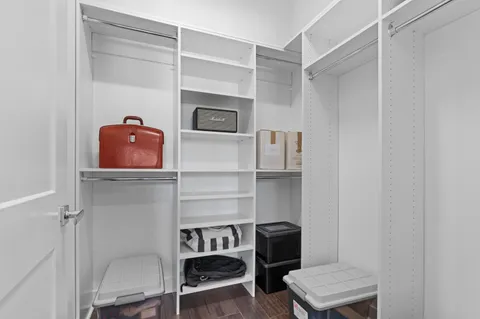 a room with cabinets and a wooden floor