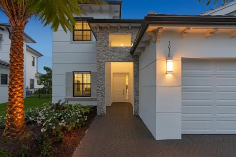 a view of a house with a street