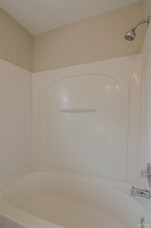 1112 North 16th Street McAllen, TX 78501 - Photo 16 of 21 a close up of a bathtub