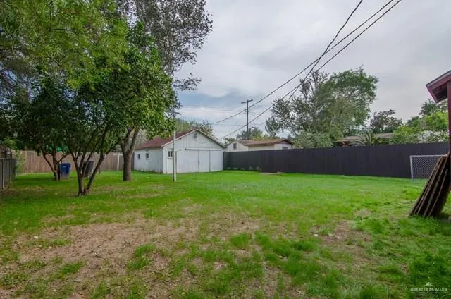 a view of backyard with green space