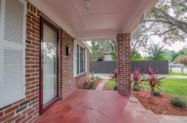 1112 North 16th Street McAllen, TX 78501 - Photo 2 of 21 a backyard of a house with a garden and outdoor seating