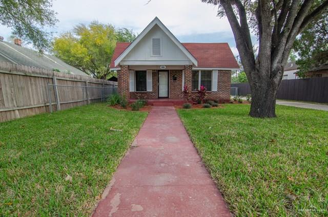 1112 North 16th Street McAllen, TX 78501 - Photo 21 of 21 a front view of a house with yard and green space