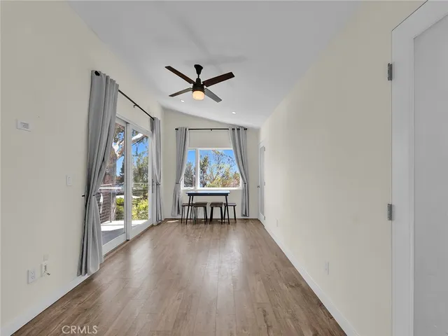 a view of a large window with wooden floor