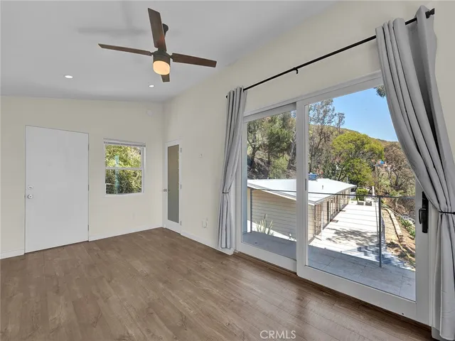 a bathroom with a toilet a sink and shower