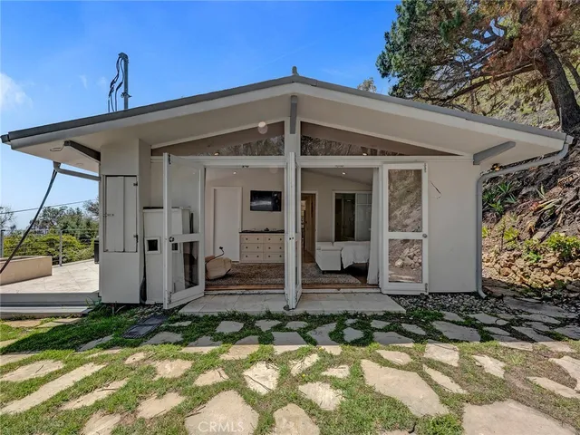 a view of a yard with an outdoor space