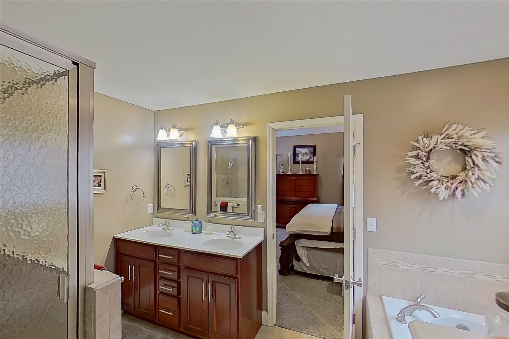 20 Fedor Circle Bloomington, IL 61705 - Photo 20 of 51 a en suite bathroom with a sink double vanity and a mirror
